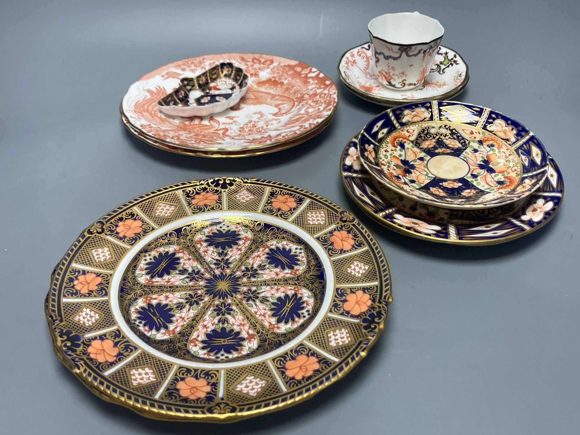 Two Royal Crown Derby Imari pattern plates, three Crown Derby plates or saucers, a Royal Crown Derby cup and two saucers and two Red Av